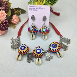 Ginni with potli necklace